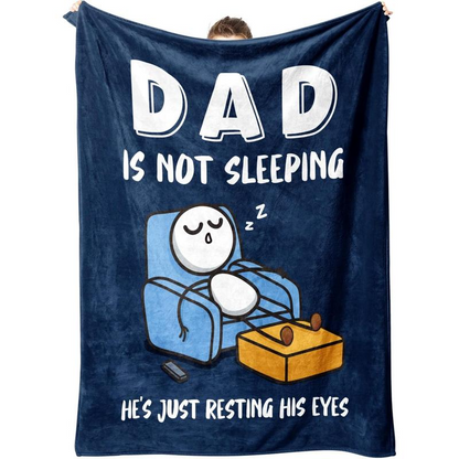 Navy blanket held up with Dad Is Not Sleeping design